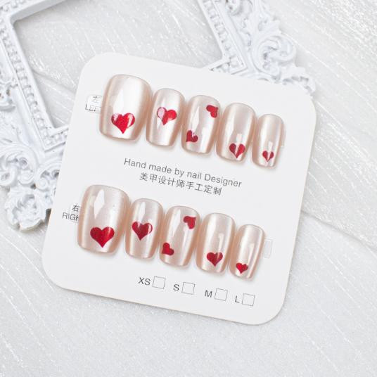 أظافر 10 تركيب بتصميم عيون القطة