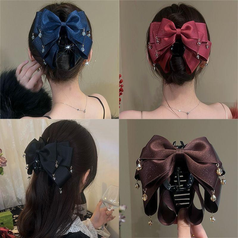 مشبك شعر نسائي مزين بعقدة وفصوص لامعة