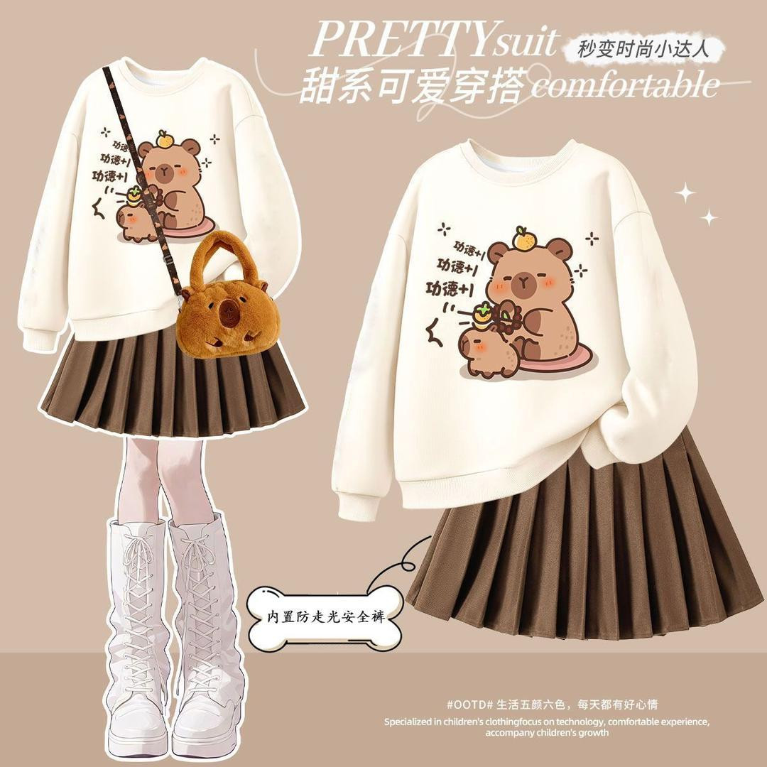 طقم بناتي (سويتر + تنورة كاجوال) موديل ربيع/خريف 2025، تصميم كرتوني عصري