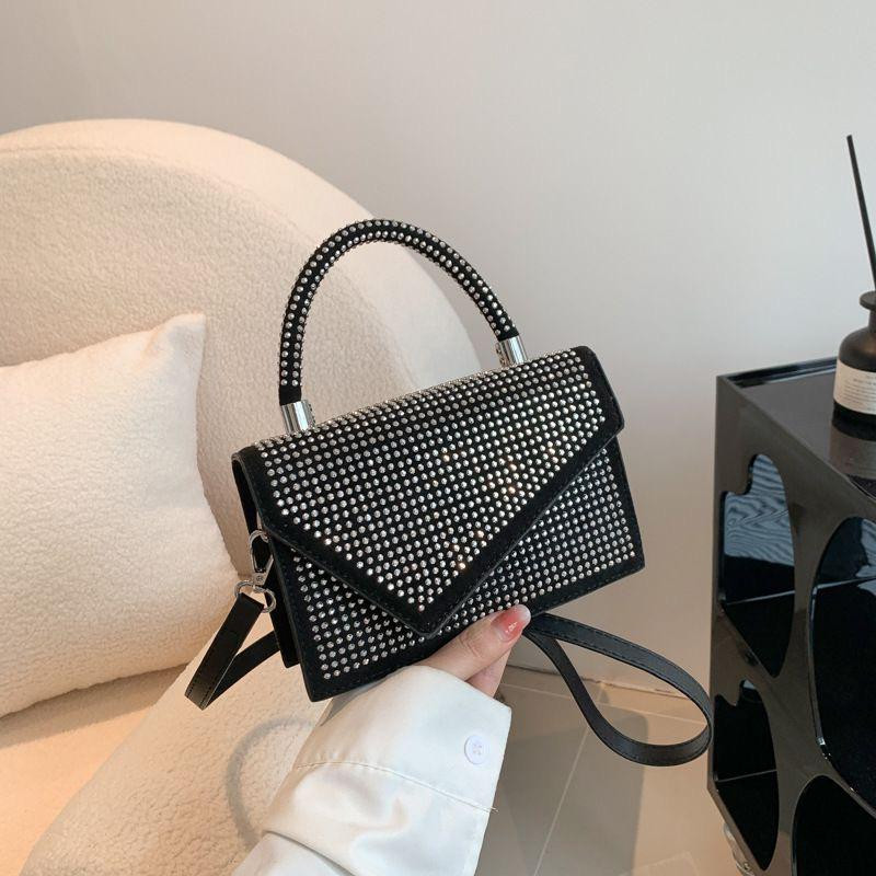 حقيبة يد نسائية لامعة بتصميم كوري أنيق