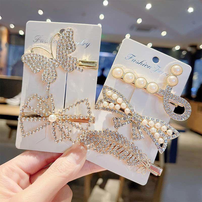 طقم من 6 مشابك شعر أنثوية أنيقة مزينة بحبات اللؤلؤ والكريستال اللامع